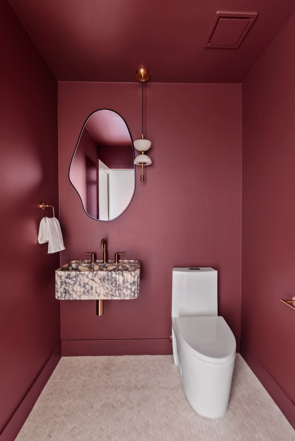 Burgundy powder room