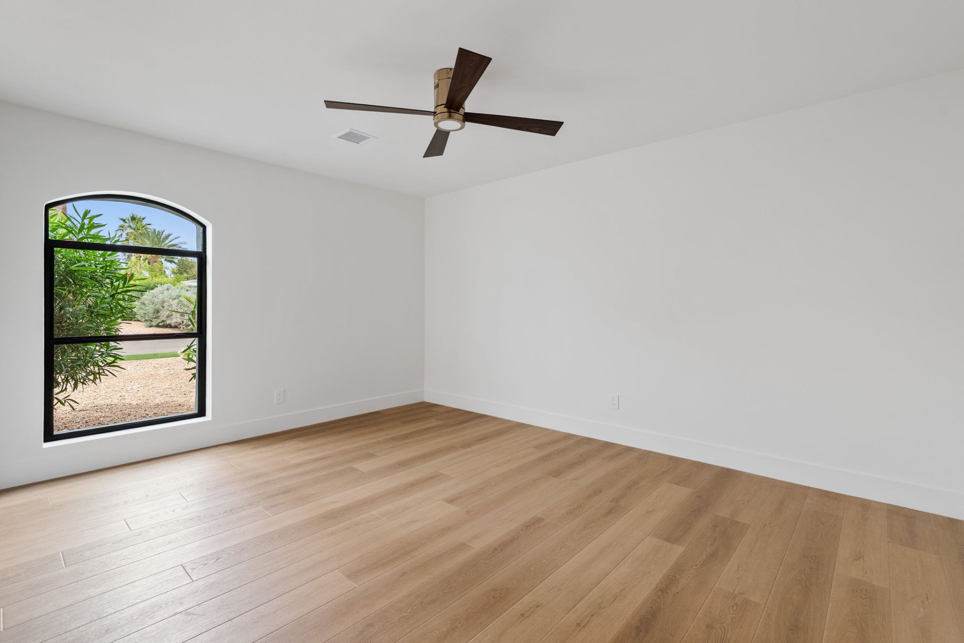 Bedroom with arched window